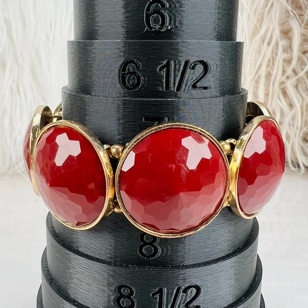 Goldtone, rust color costume stretch bracelet